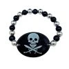 SBDOZEN 7" Black And Silver Bead With Skull And Crossbones Medallion Stretch Bracelet (Dozen) 1 SBDOZEN 7" Black And Silver Bead With Skull And Crossbones Medallion Stretch Bracelet (Dozen)