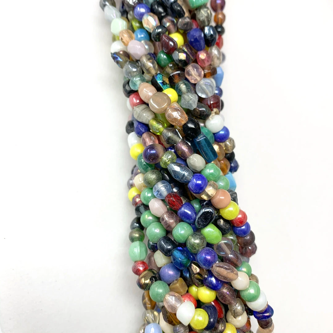 Mardi Gras Spot Beads 27" Assorted Glass Bead Necklace (Dozen) Mardi Gras Spot Beads 27" Assorted Glass Bead Necklace (Dozen)