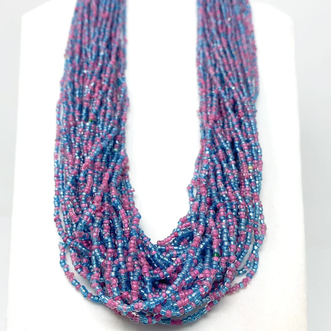 Mardi Gras Spot Beads 27" Pink And Blue Triple Strand Glass Bead Necklace (Dozen) Mardi Gras Spot Beads 27" Pink And Blue Triple Strand Glass Bead Necklace (Dozen)