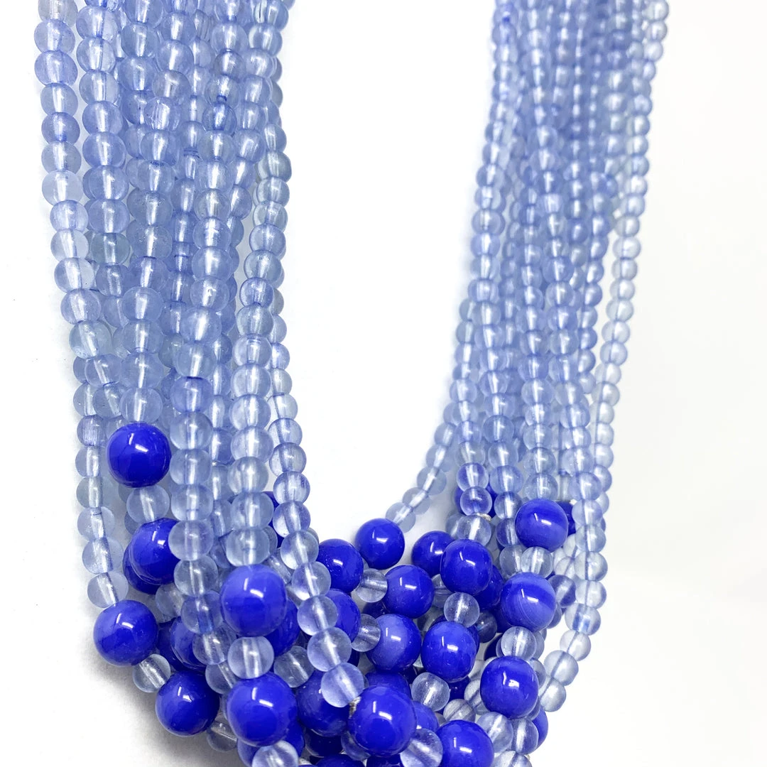 Mardi Gras Spot Beads 27" Clear/Light Blue Glass Bead Necklace (Dozen) 5 Mardi Gras Spot Beads 27" Clear/Light Blue Glass Bead Necklace (Dozen)