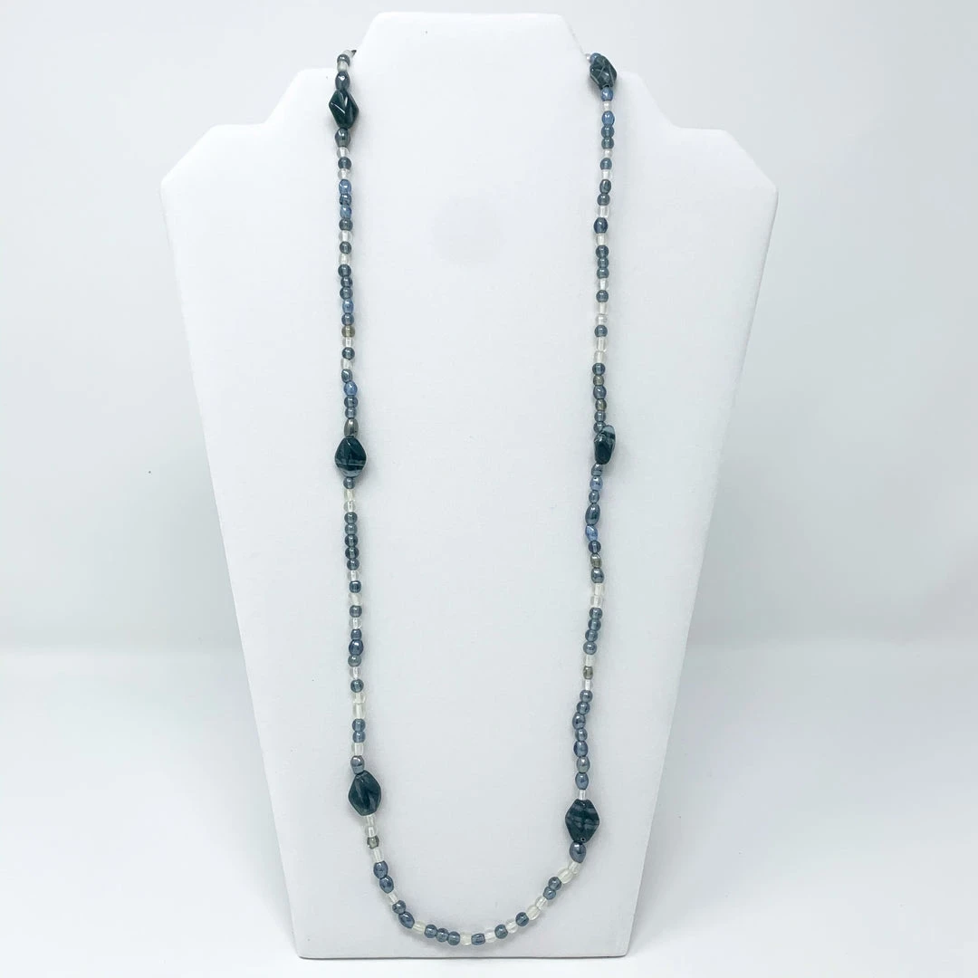 Mardi Gras Spot 27" Clear/Gray Glass Bead Necklace (Dozen) Mardi Gras Spot 27" Clear/Gray Glass Bead Necklace (Dozen)