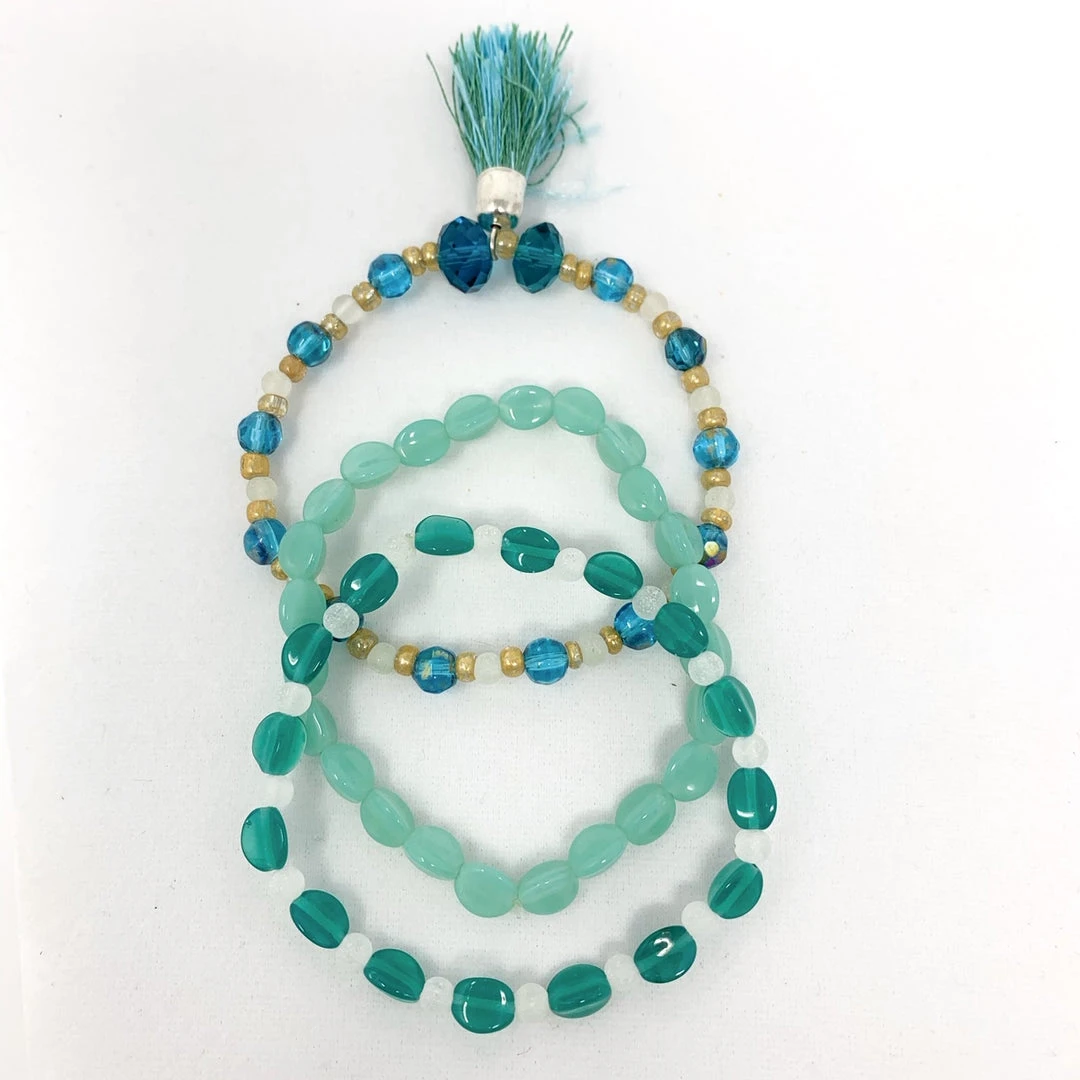 Mardi Gras Spot 7" Glass Beads - Turquoise With Gold Spacers Bracelets (Dozen) 3 Mardi Gras Spot 7" Glass Beads - Turquoise With Gold Spacers Bracelets (Dozen)