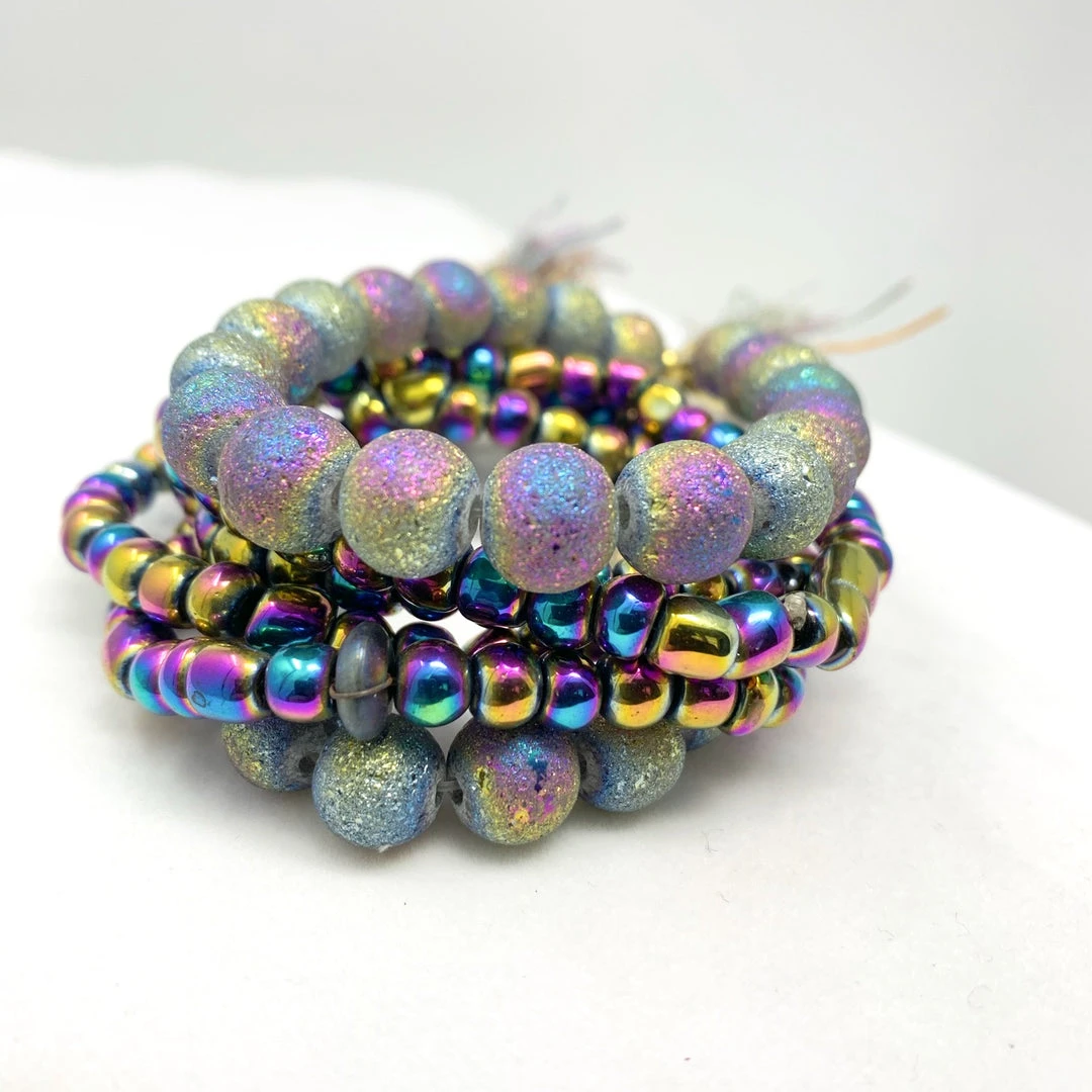 Mardi Gras Spot Beads 7" Glass Bead Bracelets - Iridescent Purple (Dozen) 4 Mardi Gras Spot Beads 7" Glass Bead Bracelets - Iridescent Purple (Dozen)