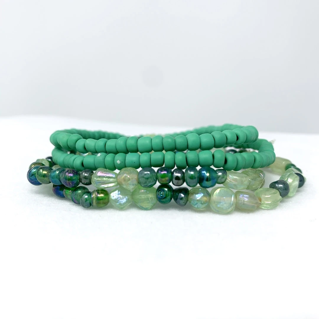 Mardi Gras Spot 7" Glass Bead Bracelets - Light Green (Dozen) Beads Mardi Gras Spot 7" Glass Bead Bracelets - Light Green (Dozen) Beads