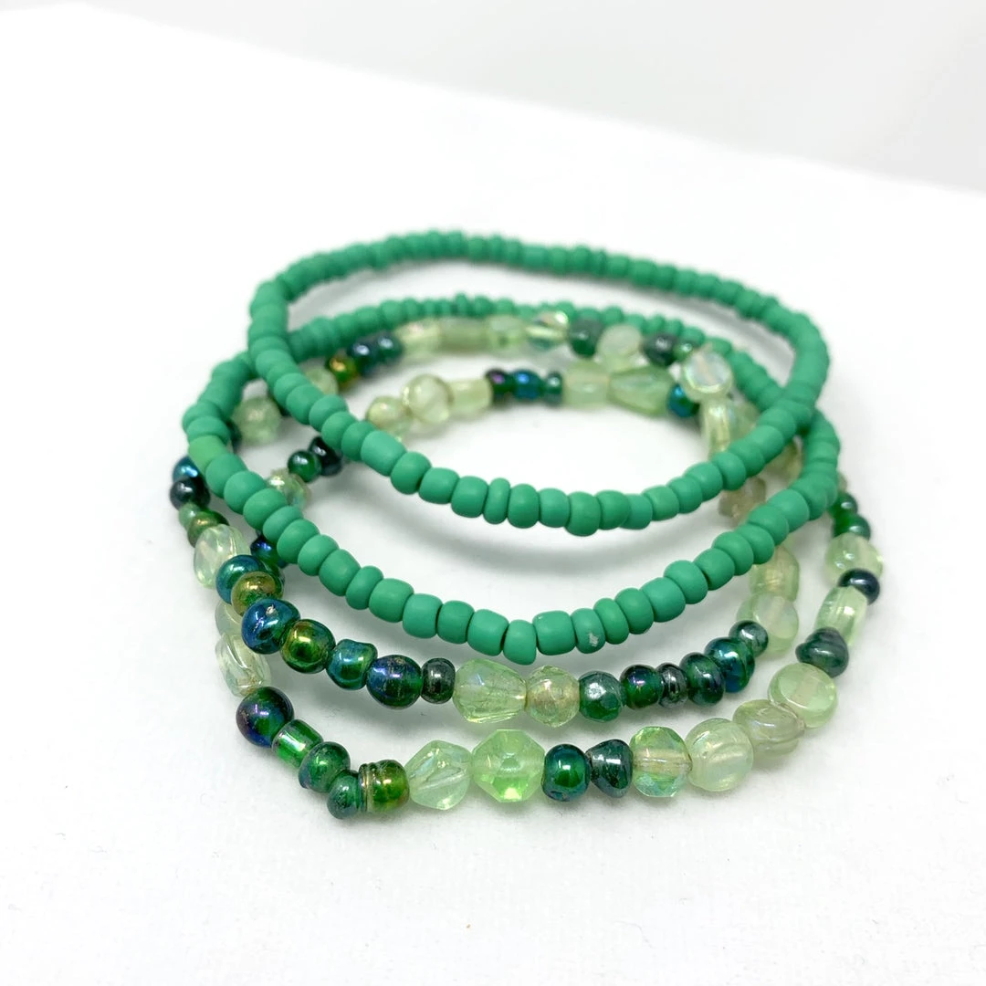 Mardi Gras Spot 7" Glass Bead Bracelets - Light Green (Dozen) Beads Mardi Gras Spot 7" Glass Bead Bracelets - Light Green (Dozen) Beads