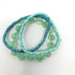 Mardi Gras Spot 7" Glass Bead Bracelets - Turquoise And Light Blue (Dozen)