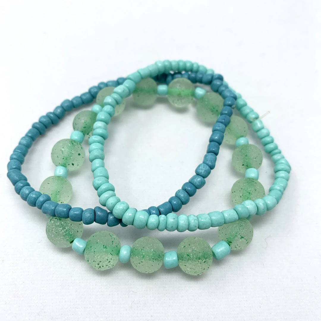 Mardi Gras Spot 7" Glass Bead Bracelets - Turquoise And Light Blue (Dozen) 4 Mardi Gras Spot 7" Glass Bead Bracelets - Turquoise And Light Blue (Dozen)