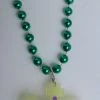 SB10625 33" 7mm Green With Mardi Gras Crown Silicon Light-Up Necklace (Each) 2 SB10625 33" 7mm Green With Mardi Gras Crown Silicon Light-Up Necklace (Each)