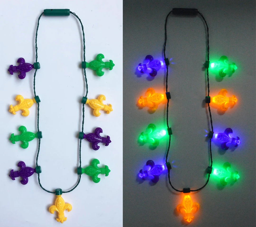 Mardi Gras Spot Light-Ups LED Purple, Green And Yellow Fleur De Lis Necklace Mardi Gras Spot Light-Ups LED Purple, Green And Yellow Fleur De Lis Necklace