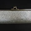 Sale Novelties Silver Glitter Clutch Purse 8" X 3" With Chain (Each) 1 Sale Novelties Silver Glitter Clutch Purse 8" X 3" With Chain (Each)